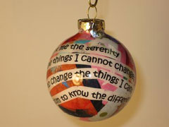 Christmas tree ornament with motivational text on it