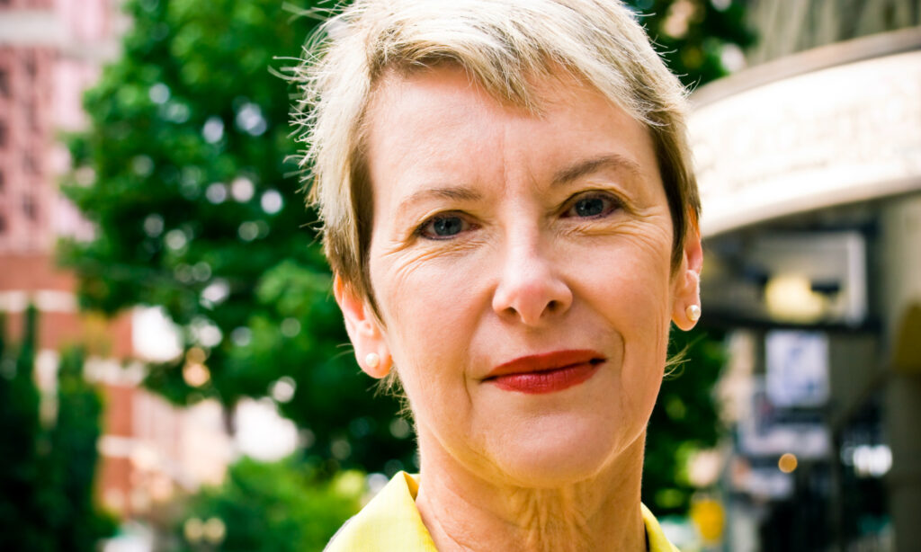 Head shot of woman with blond hair.