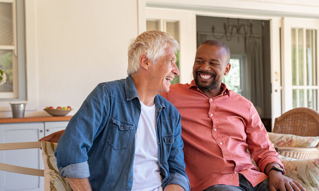 Two men sitting on bench