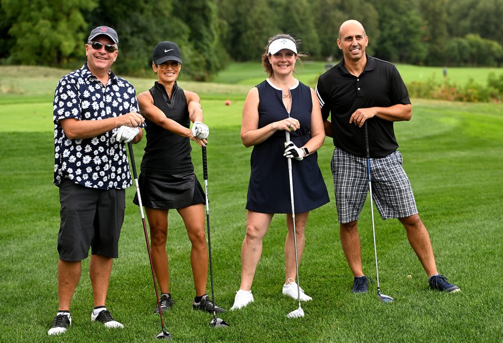 Group of golfers at the Recovery Shot golf tournament