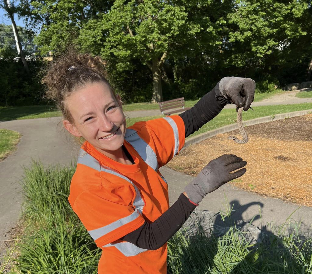 Emily holds a worm