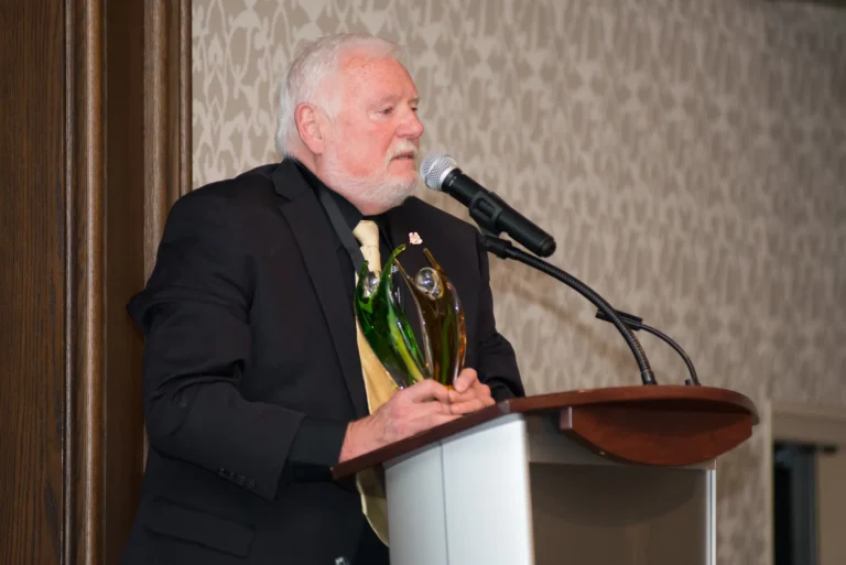 Dennis James receiving the Ed & Bobby Yielding Award at the 2017 Guardian Angel Luncheon.